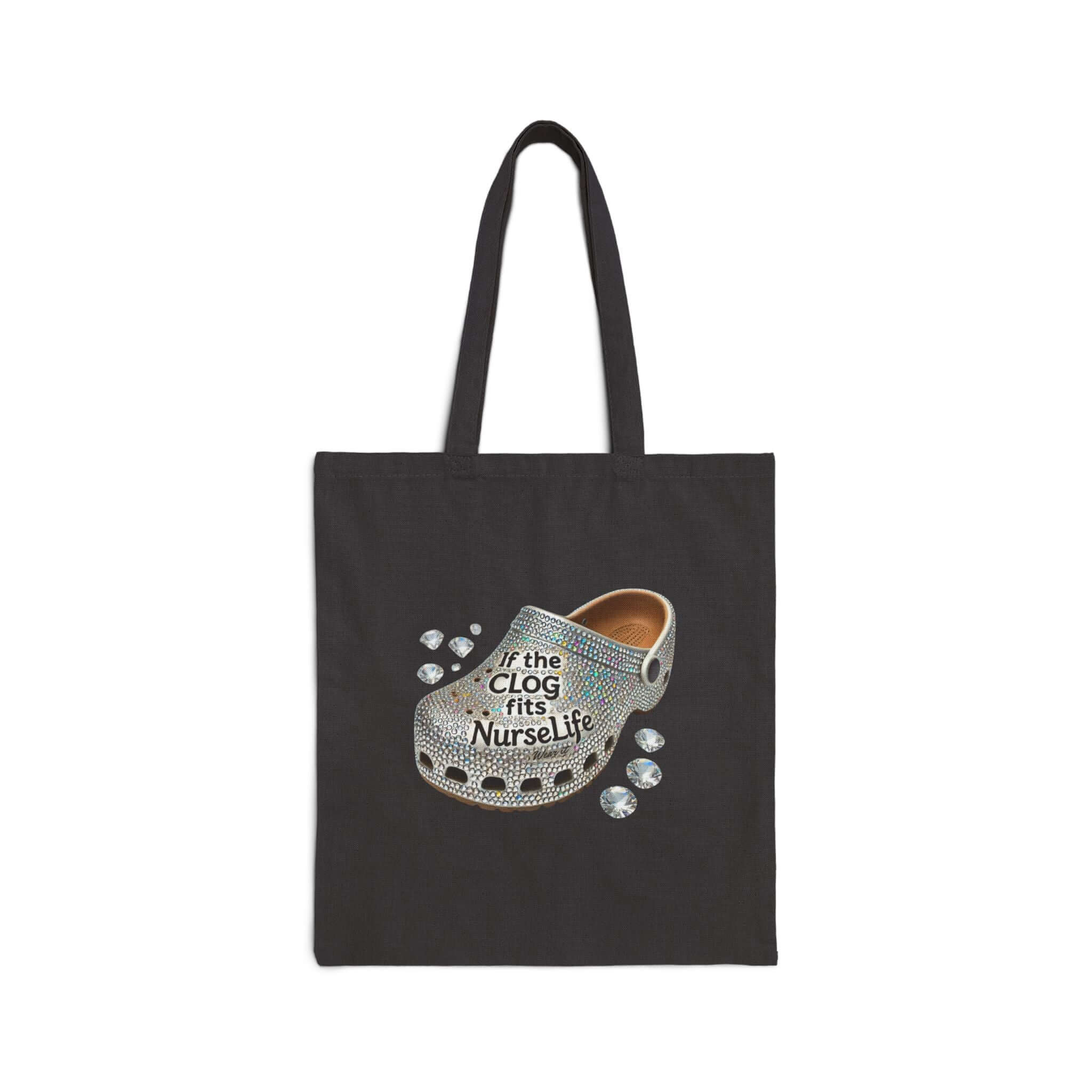Black canvas bag featuring a rhinestone clog design and the saying 'if the clog fits, nurse life'.
