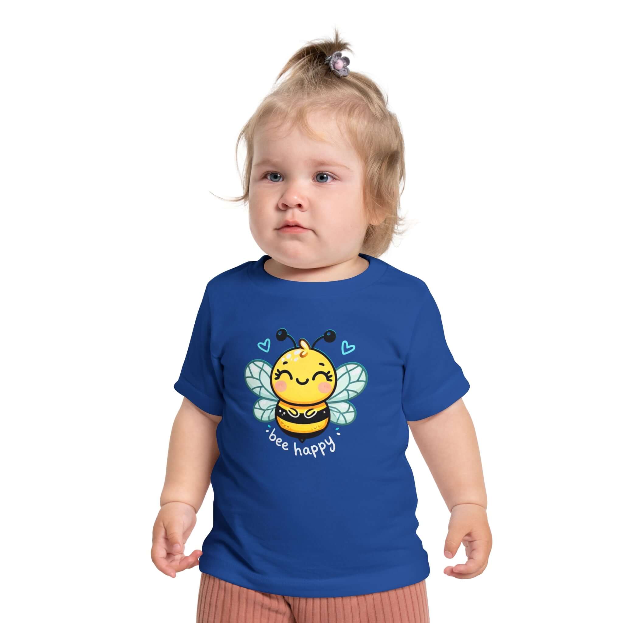 Toddler in blue Bee happy shirt with cute bumble bee design, smiling and wearing short sleeves.