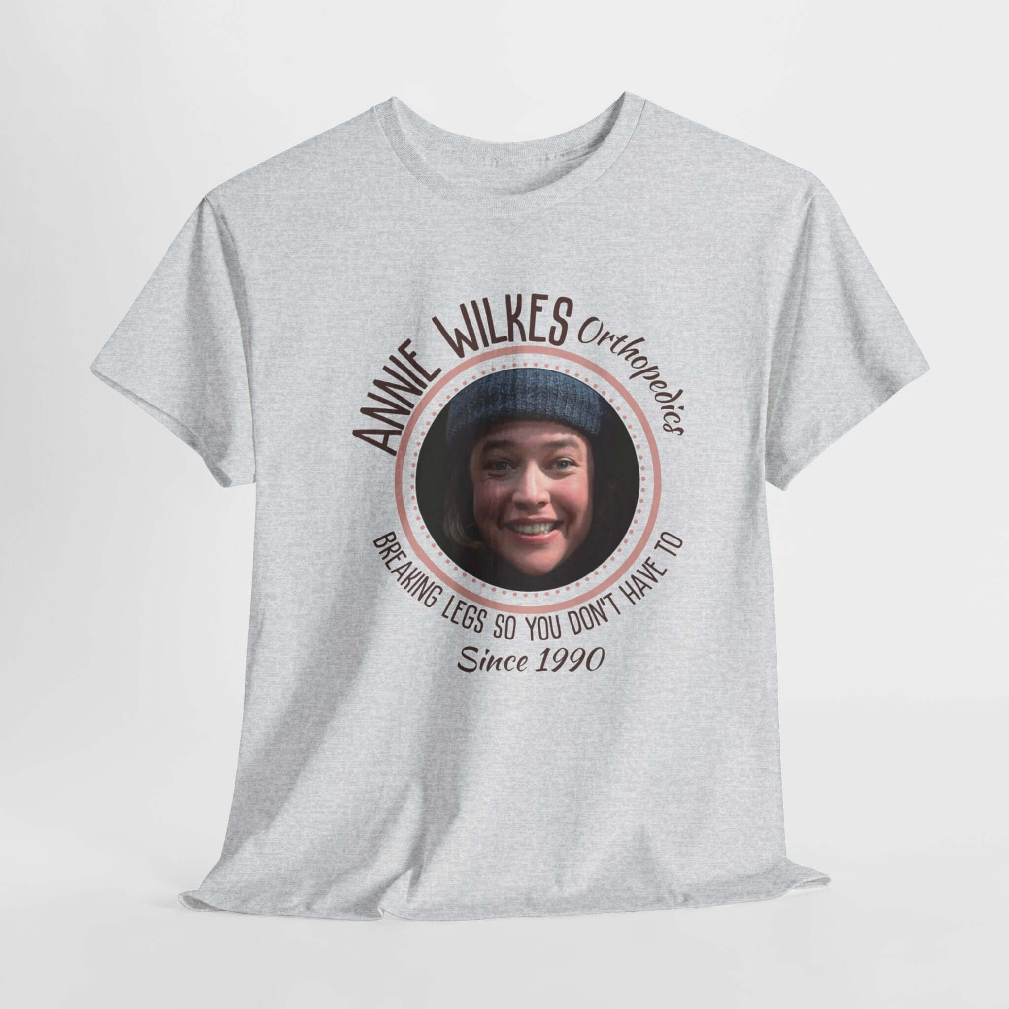 Annie Wilkes Misery nurse shirt featuring humorous quote 'Breaking Legs So You Don't Have To' since 1990.