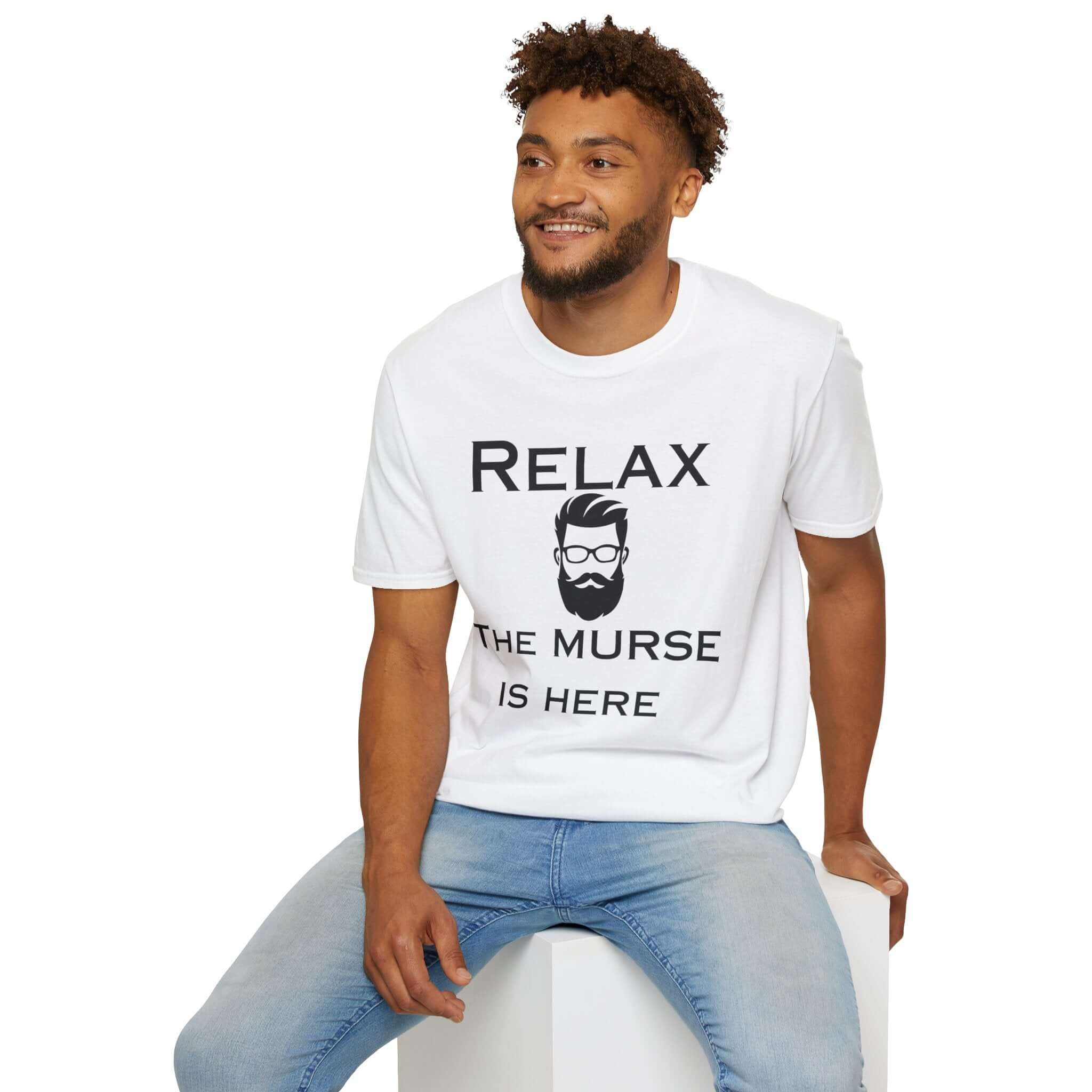 Model wearing a white men's t-shirt with the saying 'Relax The Murse is Here' for male nurses.