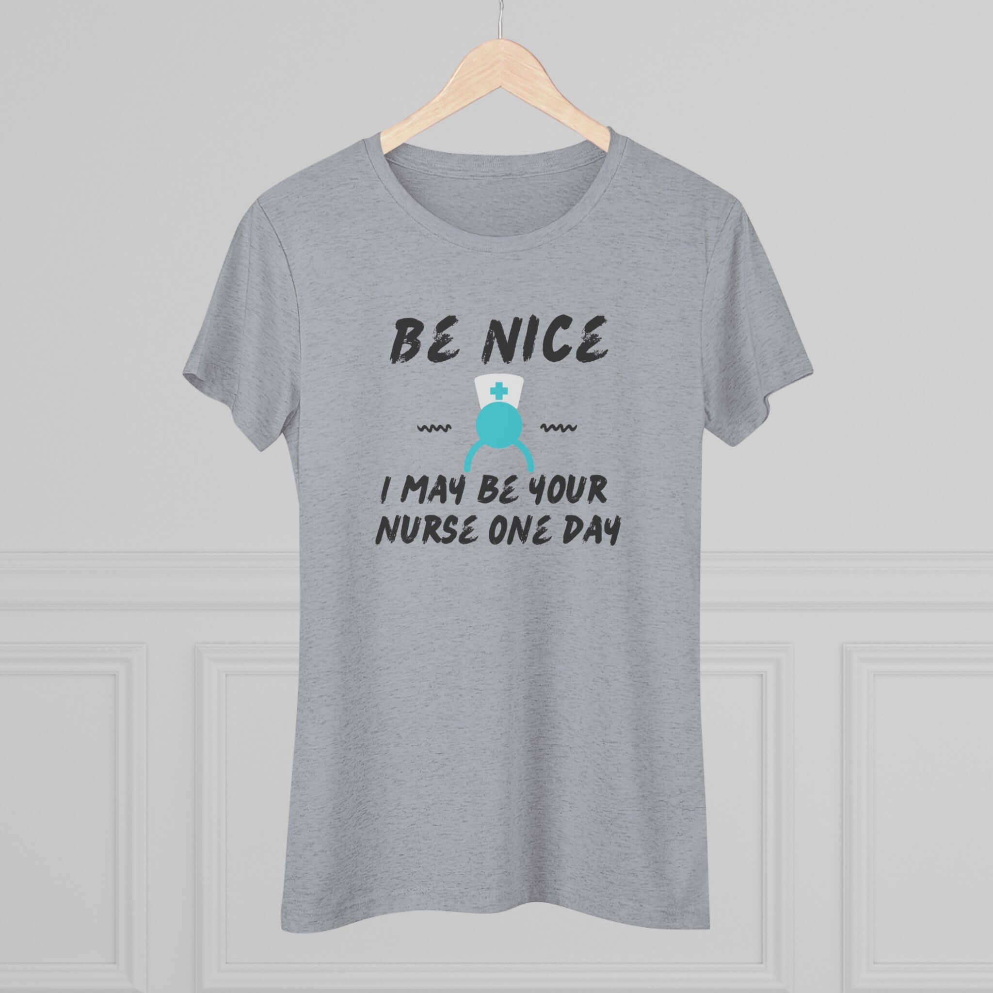 Light gray triblend t-shirt featuring the saying 'Be Nice I May Be Your Nurse One Day' with a cute nurse graphic.