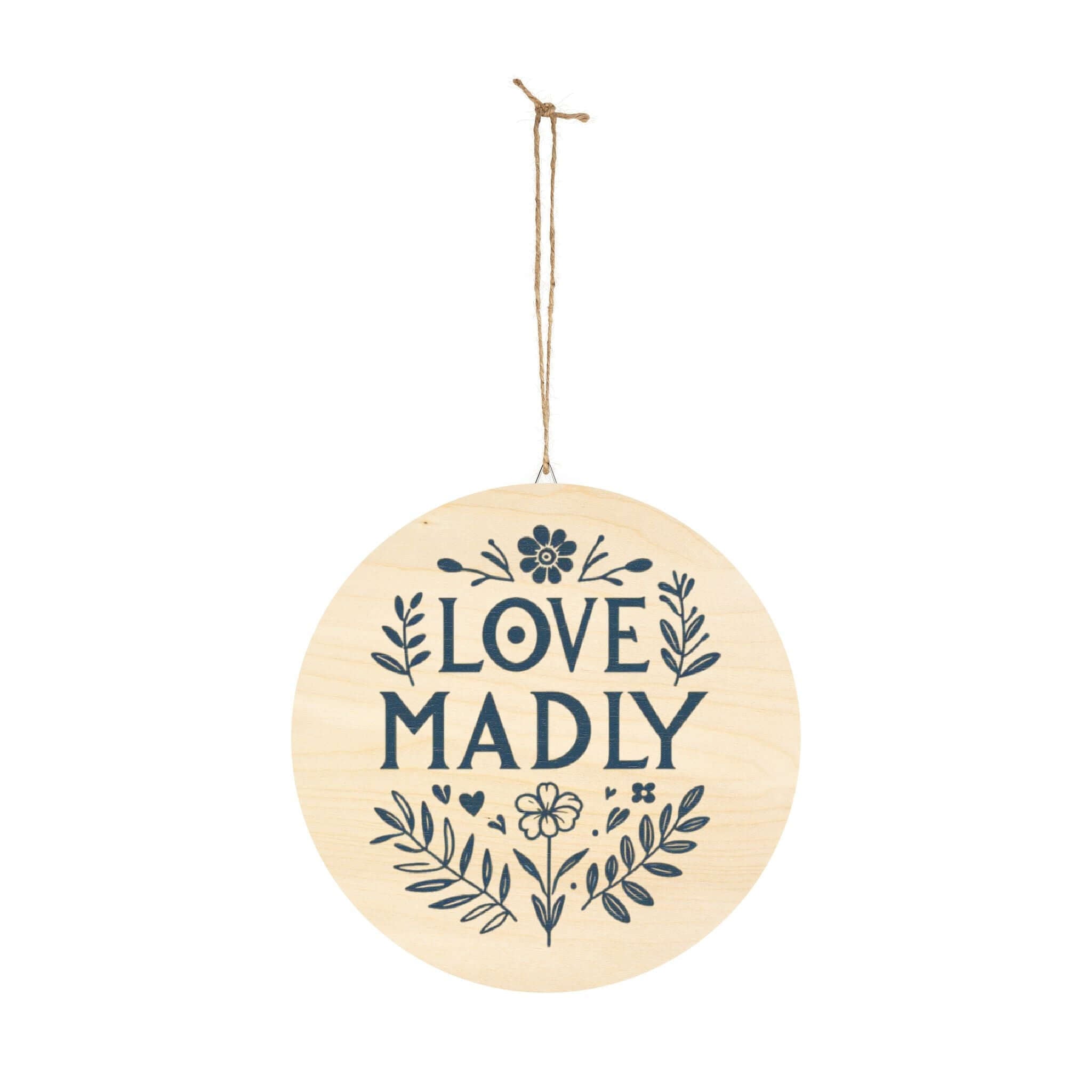 Circular hanging wood sign that says 'Love Madly' with floral design, perfect for home decor and gifts.