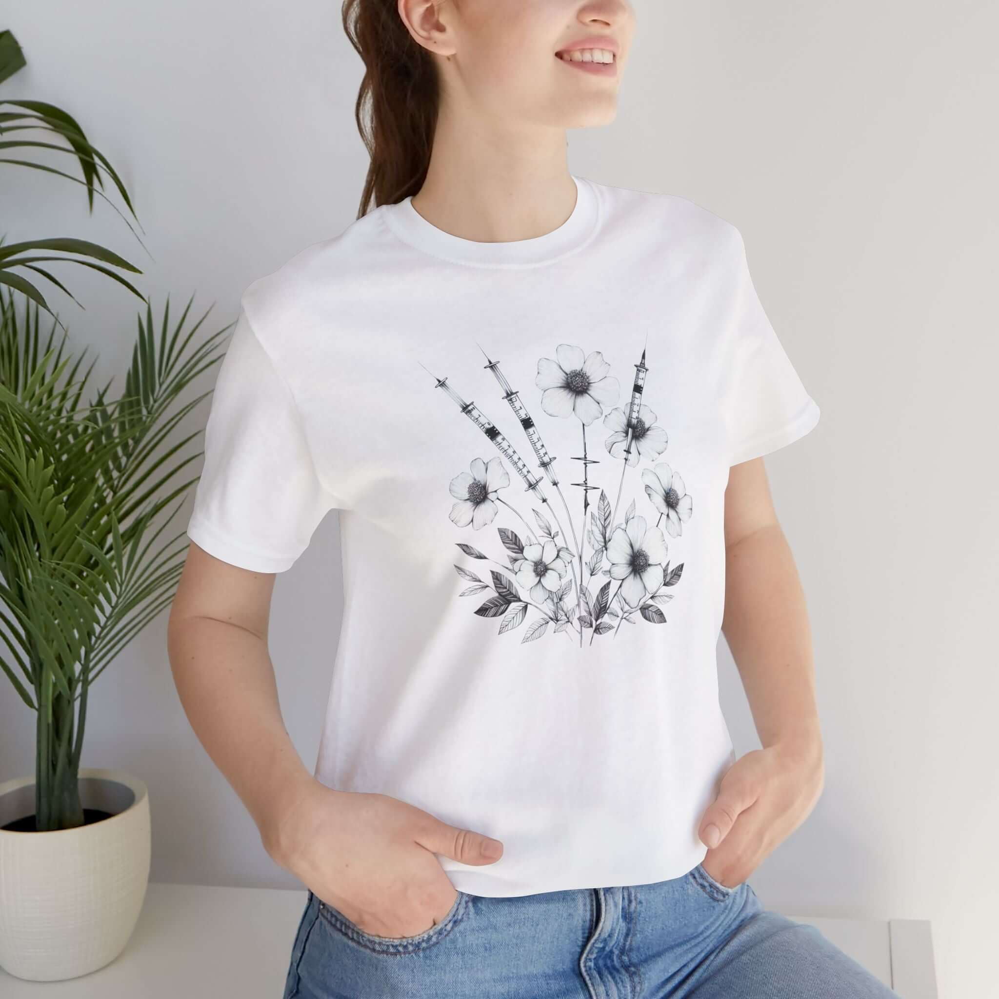 Keep Blooming Medical T-Shirt with floral design and medical instruments, perfect for healthcare professionals.