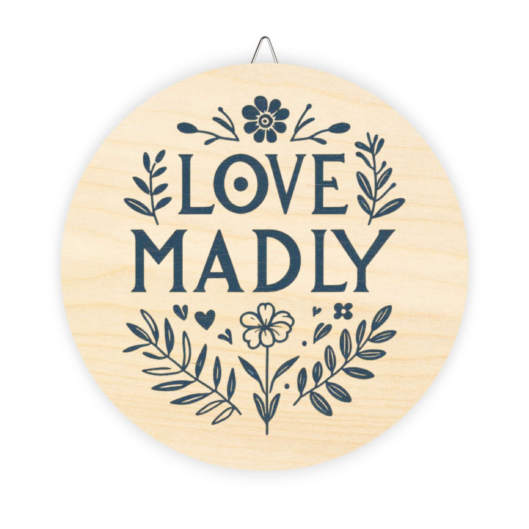 Circular hanging wood sign that says 'Love Madly' with floral designs, perfect for home decor and gifts.