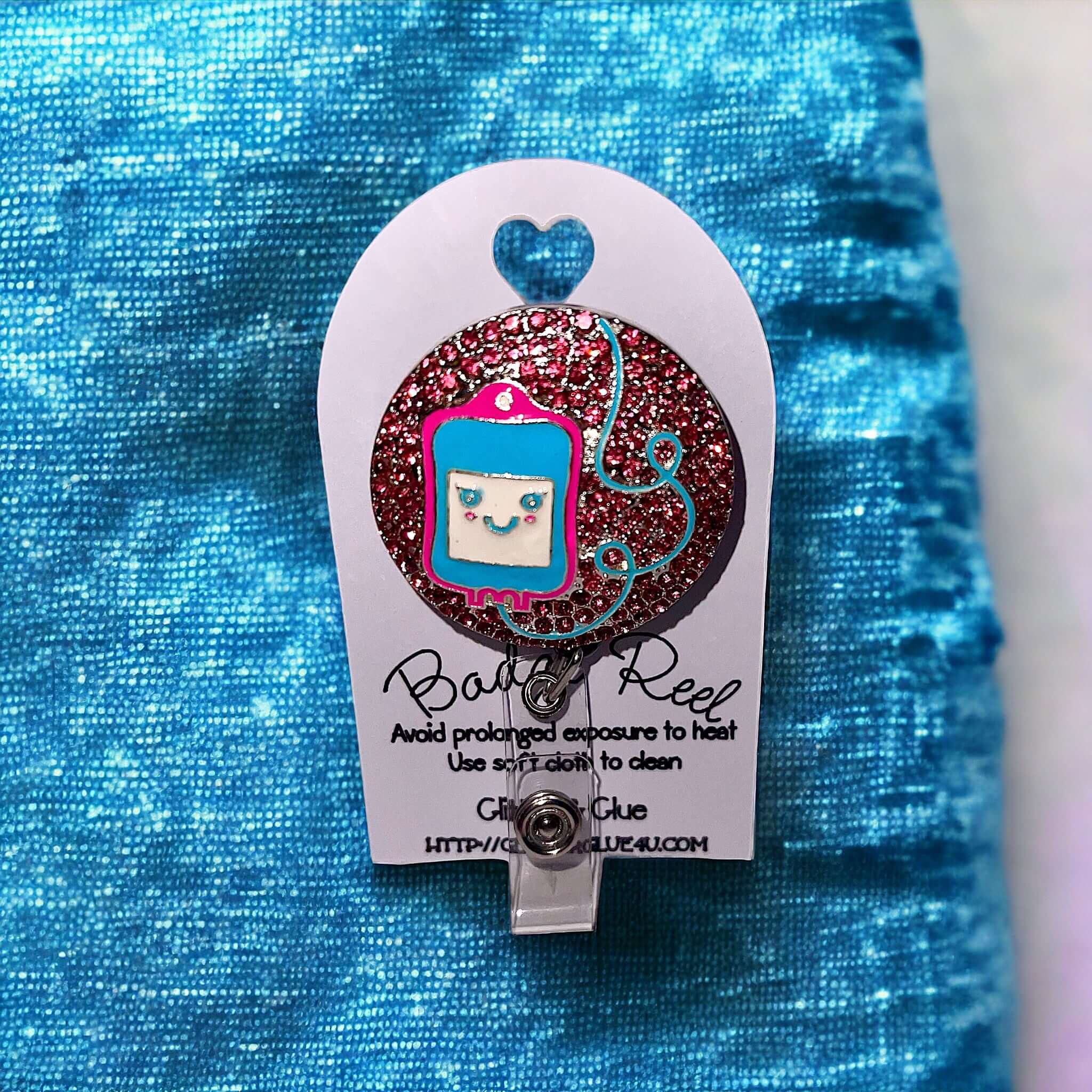 Bling healthcare badge reel featuring a cute character design and rhinestone embellishments on a colorful background.